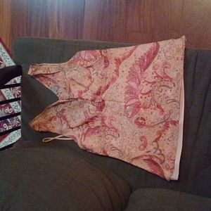 Ann Taylor sleeveless blouse with attached camisole.